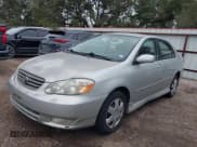 ✅ 2003 Toyota Corolla CE • VIN: 1NXBR32E63Z169795 • Lot: 41450619. Listed on IAAI with 215,222 mi. Free auction sales archive from the USA and detailed vehicle history report at DreamBid. Image 2.
