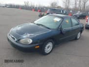 ✅ 1997 Mercury Sable GS • VIN: 1MELM50U5VA656308 • Lot: 41882560. Wystawiony na IAAI z przebiegiem 91 017 mil. Bezpłatny archiwum sprzedaży aukcyjnych z USA i szczegółowy raport historii pojazdu na DreamBid. Zdjęcie 2.