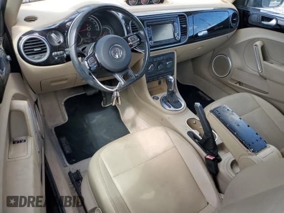 ✅ 2014 Volkswagen Beetle 2.0L TDI w/Sun/Sound/Nav • VIN: 3VWJL7AT3EM612241 • Лот: 69420065. Опубликован ранее на Copart с пробегом 55 670 миль. Бесплатный доступ к архиву аукционных продаж из США и подробный отчёт об истории автомобиля на DreamBid. Изображение 8.