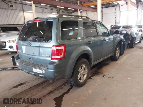 ✅ 2011 Ford Escape Hybrid • VIN: 1FMCU4K31BKC63987 • Лот: 41987374. Опубликован ранее на IAAI с пробегом 111 568 миль. Бесплатный доступ к архиву аукционных продаж из США и подробный отчёт об истории автомобиля на DreamBid. Изображение 4.
