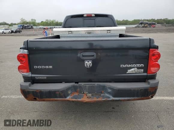 2010 Dodge Dakota Bighorn/Lonestar with VIN 1D7CW3BK3AS104568, listed as a Copart auction lot 58978445 with 160,774 mi miles and Clean title. Bid and sale history available at DreamBid. Image 6.