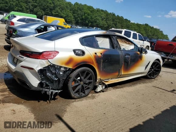 ✅ 2024 BMW 8 Series M850i • VIN: WBAGV8C06RCN49236 • Lot: 88115505. Listed on Copart with Not provided. Free auction sales archive from the USA and detailed vehicle history report at DreamBid. Image 3.