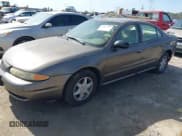 ✅ 2002 Oldsmobile Alero GL1 • VIN: 1G3NL52E82C172314 • Lot: 41465789. Wystawiony na IAAI z przebiegiem 118 427 mil. Bezpłatny archiwum sprzedaży aukcyjnych z USA i szczegółowy raport historii pojazdu na DreamBid. Zdjęcie 2.