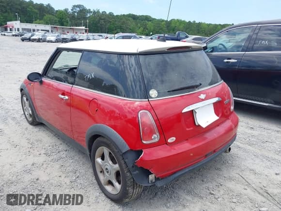 ✅ 2005 MINI Hardtop • VIN: WMWRC33505TK62708 • Lot: 42343742. Listed on IAAI with 182,883 mi. Free auction sales archive from the USA and detailed vehicle history report at DreamBid. Image 3.