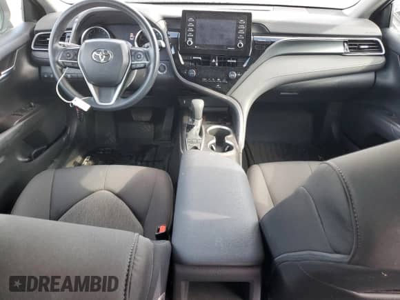 2022 Toyota Camry LE с VIN 4T1R11BK3NU060035, выставлен на аукционе Copart как лот 89728225 с пробегом 25 477 миль миль и Списание • Salvage title. История ставок и продаж доступна на DreamBid. Изображение 8.