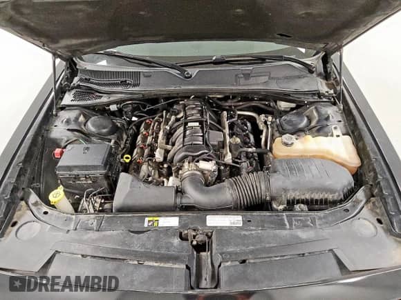 2014 Dodge Challenger R/T с VIN 2C3CDYBT5EH310871, выставлен на аукционе Copart как лот 63413965 с пробегом 95 604 миль миль и Чистый • Clean title. История ставок и продаж доступна на DreamBid. Изображение 11.