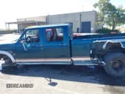 ✅ 1996 Ford F-350 • VIN: 1FTJW35F5TEA87189 • Lot: 42228541. Listed on IAAI with 228,747 mi. Free auction sales archive from the USA and detailed vehicle history report at DreamBid. Image 14.