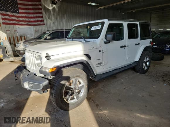 ✅ 2018 Jeep Wrangler Unlimited Sahara • VIN: 1C4HJXEG6JW216240 • Лот: 81991285. Опубликован ранее на Copart с пробегом 87 608 миль. Бесплатный доступ к архиву аукционных продаж из США и подробный отчёт об истории автомобиля на DreamBid. Изображение 1.