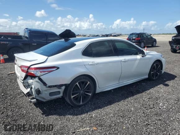 2020 Toyota Camry XSE с VIN 4T1K61AK9LU922613, выставлен на аукционе Copart как лот 85858935 с пробегом 104 797 миль миль и Списание • Salvage title. История ставок и продаж доступна на DreamBid. Изображение 3.