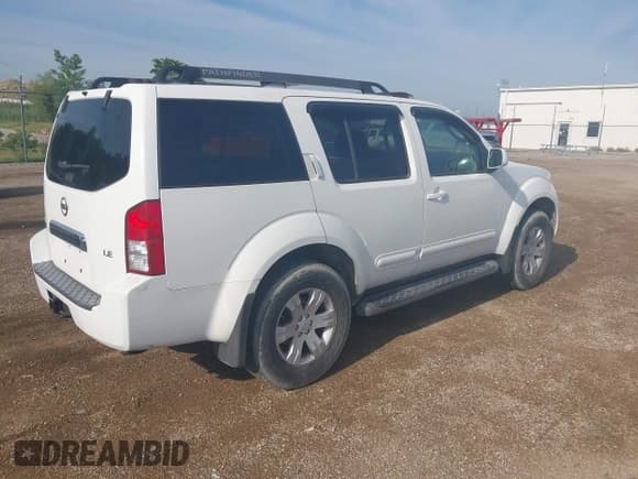 ✅ 2005 Nissan Pathfinder XE • VIN: 5N1AR18W05C762321 • Lot: 42714252. Listed on IAAI with 149,335 mi. Free auction sales archive from the USA and detailed vehicle history report at DreamBid. Image 4.