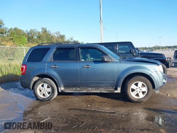 ✅ 2011 Ford Escape XLT • VIN: 1FMCU0DG0BKB77448 • Лот: 43440882. Опубликован ранее на IAAI с пробегом 172 911 миль. Бесплатный доступ к архиву аукционных продаж из США и подробный отчёт об истории автомобиля на DreamBid. Изображение 13.