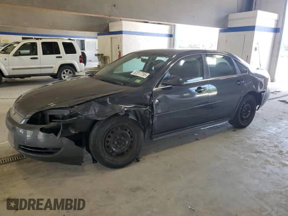 2015 Chevrolet Impala Police Police z VIN 2G1WD5E36F1157424, wystawiony jako Copart lot #62017755 z przebiegiem 185 746 mil mil oraz Szkoda całkowita • Salvage title. Historia ofert i sprzedaży dostępna na DreamBid. Obrazek 1.