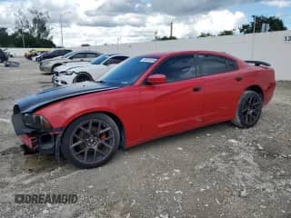 2012 Dodge Charger SXT Plus z VIN 2C3CDXHG5CH164098, wystawiony jako Copart lot #80289005 z przebiegiem 158 892 mil mil oraz Szkoda całkowita • Salvage title. Historia ofert i sprzedaży dostępna na DreamBid. Obrazek 1.
