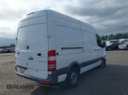 ✅ 2014 Mercedes-Benz Sprinter Cargo • VIN: WD3PE7CC6E5856339 • Lot: 39816320. Listed on IAAI with 148,353 mi. Free auction sales archive from the USA and detailed vehicle history report at DreamBid. Image 4.