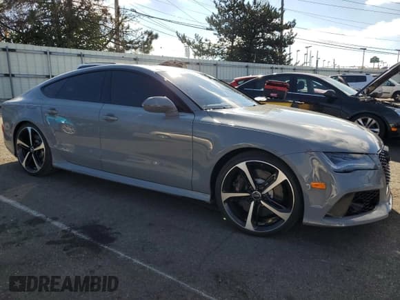 ✅ 2014 Audi RS 7 Prestige • VIN: WUAW2AFC6EN902998 • Lot: 79103904. Listed on Copart with 70,342 mi. Free auction sales archive from the USA and detailed vehicle history report at DreamBid. Image 4.
