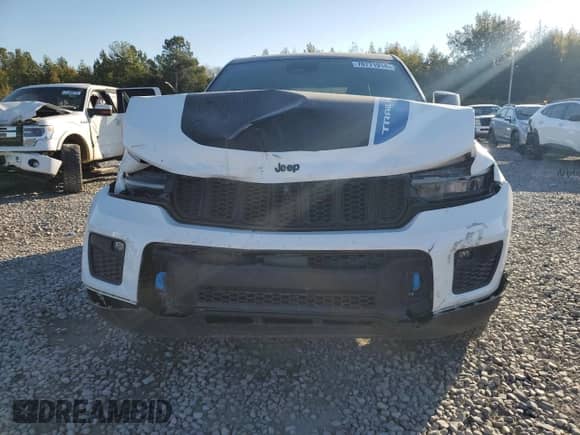 2022 Jeep Grand Cherokee Trailhawk with VIN 1C4RJYC63N8747507, listed as a Copart auction lot 76771914 with 18,057 mi miles and Salvage title. Bid and sale history available at DreamBid. Image 5.