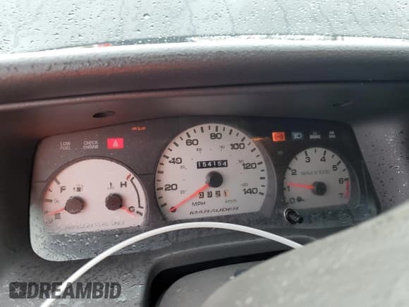 ✅ 2003 Mercury Marauder • VIN: 2MEHM75V03X633896 • Лот: 47188565. Опубликован ранее на Copart с пробегом 154 154 миль. Бесплатный доступ к архиву аукционных продаж из США и подробный отчёт об истории автомобиля на DreamBid. Изображение 9.