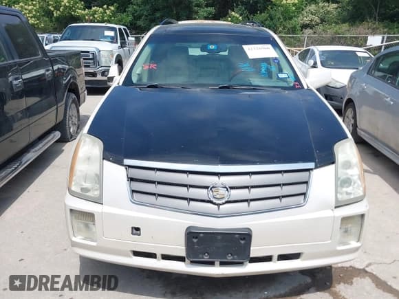 ✅ 2004 Cadillac SRX • VIN: 1GYDE637140126124 • Lot: 42326960. Listed on IAAI with Not provided. Free auction sales archive from the USA and detailed vehicle history report at DreamBid. Image 6.