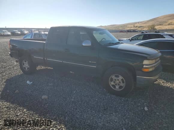 2001 Chevrolet Silverado 1500 LS z VIN 1GCEK19T01E259501, wystawiony jako Copart lot #85784615 z przebiegiem 332 511 mil mil oraz Czysty tytuł • Clean title. Historia ofert i sprzedaży dostępna na DreamBid. Obrazek 4.