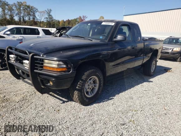 ✅ 2002 Dodge Dakota Sport • VIN: 1B7GG32N22S675781 • Lot: 77658574. Wystawiony na Copart z przebiegiem 200 462 mil. Bezpłatny archiwum sprzedaży aukcyjnych z USA i szczegółowy raport historii pojazdu na DreamBid. Zdjęcie 1.