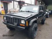 ✅ 1998 Jeep Cherokee Sport • VIN: 1J4FJ68S1WL266581 • Lot: 41446293. Listed on IAAI with 149,202 mi. Free auction sales archive from the USA and detailed vehicle history report at DreamBid. Image 2.