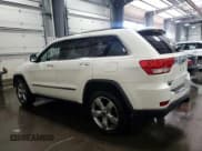 ✅ 2012 Jeep Grand Cherokee Overland • VIN: 1C4RJFCG7CC324310 • Lot: 84262345. Listed on Copart with 155,354 mi. Free auction sales archive from the USA and detailed vehicle history report at DreamBid. Image 2.