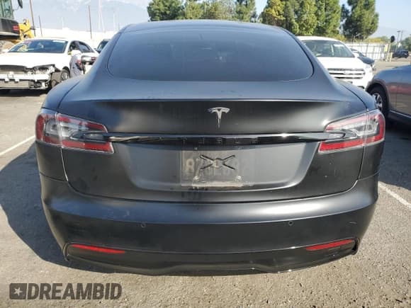 ✅ 2021 Tesla Model S Long Range • VIN: 5YJSA1E54MF443243 • Lot: 90926175. Listed on Copart with 55,633 mi. Free auction sales archive from the USA and detailed vehicle history report at DreamBid. Image 7.