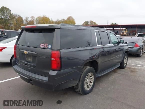 ✅ 2015 Chevrolet Suburban LT • VIN: 1GNSCJKC2FR124201 • Lot: 43614947. Listed on IAAI with 221,947 mi. Free auction sales archive from the USA and detailed vehicle history report at DreamBid. Image 4.