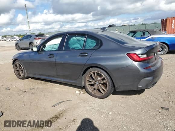 2021 BMW 3 Series M340i with VIN WBA5U7C0XMFL33109, listed as a Copart auction lot 80183354 with Not provided miles and Salvage title. Bid and sale history available at DreamBid. Image 2.