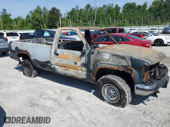 2000 Chevrolet Silverado 3500 с VIN 1GCHK34R7YR127939, выставлен на аукционе Copart как лот 65550435 с пробегом Не указан миль и Списание • Salvage title. История ставок и продаж доступна на DreamBid. Изображение 4.