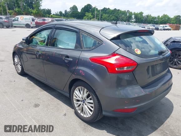✅ 2016 Ford Focus Titanium • VIN: 1FADP3N20GL275763 • Лот: 42511959. Опубликован ранее на IAAI с пробегом 124 891 миль. Бесплатный доступ к архиву аукционных продаж из США и подробный отчёт об истории автомобиля на DreamBid. Изображение 3.