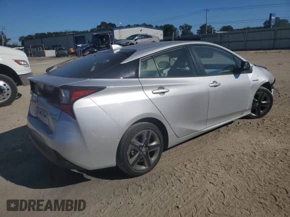 2021 Toyota Prius L Eco with VIN JTDKAMFU7M3137514, listed as a Copart auction lot 85843795 with 31,718 mi miles and Salvage title. Bid and sale history available at DreamBid. Image 3.