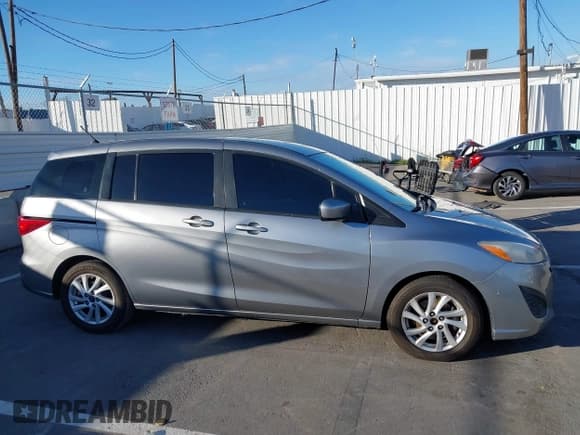 ✅ 2012 Mazda 5 Sport • VIN: JM1CW2BL9C0143161 • Лот: 43663744. Опубликован ранее на IAAI с пробегом 175 812 миль. Бесплатный доступ к архиву аукционных продаж из США и подробный отчёт об истории автомобиля на DreamBid. Изображение 13.