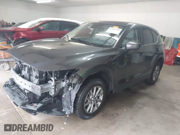 ✅ 2022 Mazda CX-5 S Carbon Edition • VIN: JM3KFBCM1N0577670 • Лот: 43821338. Опубликован ранее на IAAI с пробегом 59 967 миль. Бесплатный доступ к архиву аукционных продаж из США и подробный отчёт об истории автомобиля на DreamBid. Изображение 2.