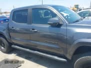 ✅ 2021 Toyota Tacoma SR5 • VIN: 3TMAZ5CN7MM146624 • Lot: 42565834. Listed on IAAI with 65,629 mi. Free auction sales archive from the USA and detailed vehicle history report at DreamBid. Image 13.