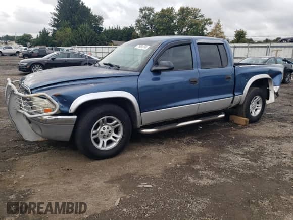 2003 Dodge Dakota SLT с VIN 1D7HL48X93S367092, выставлен на аукционе Copart как лот 71961274 с пробегом 160 709 миль миль и Списание • Salvage title. История ставок и продаж доступна на DreamBid. Изображение 1.