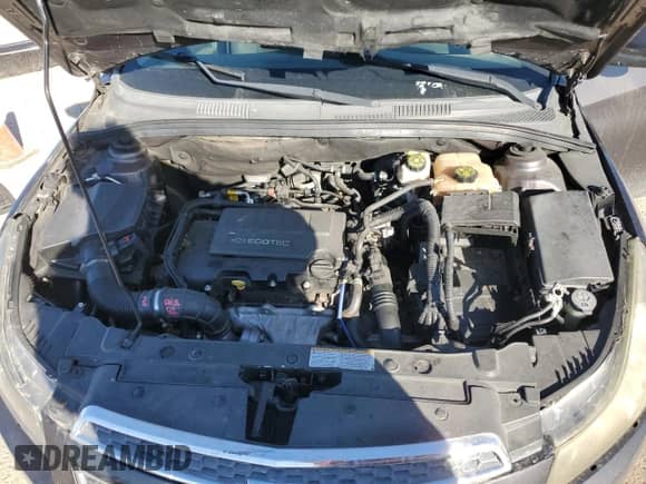 2014 Chevrolet Cruze 1LT z VIN 1G1PC5SB7E7104686, wystawiony jako Copart lot #87261175 z przebiegiem 114 359 mil mil oraz Szkoda całkowita • Salvage title. Historia ofert i sprzedaży dostępna na DreamBid. Obrazek 11.