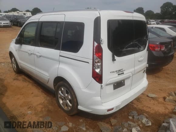 ✅ 2017 Ford Transit Connect XLT • VIN: NM0AS8F71H1316818 • Lot: 56379045. Listed on Copart with 92,451 mi. Free auction sales archive from the USA and detailed vehicle history report at DreamBid. Image 2.