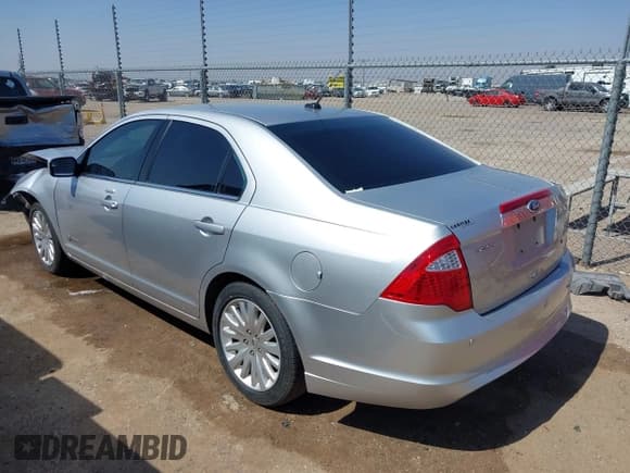 ✅ 2011 Ford Fusion Hybrid • VIN: 3FADP0L32BR345235 • Lot: 42322127. Listed on IAAI with 120,968 mi. Free auction sales archive from the USA and detailed vehicle history report at DreamBid. Image 3.