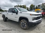 ✅ 2024 Chevrolet Silverado 2500HD Custom • VIN: 2GC1YME74R1253124 • Lot: 82267085. Listed on Copart with 9,765 mi. Free auction sales archive from the USA and detailed vehicle history report at DreamBid. Image 4.