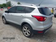 ✅ 2019 Ford Escape Titanium • VIN: 1FMCU9J90KUA13714 • Лот: 43020434. Опубликован ранее на IAAI с пробегом 150 862 миль. Бесплатный доступ к архиву аукционных продаж из США и подробный отчёт об истории автомобиля на DreamBid. Изображение 3.
