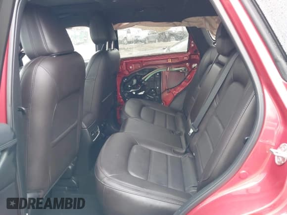 ✅ 2022 Mazda CX-5 Signature • VIN: JM3KFBXYXN0607777 • Lot: 41563918. Listed on IAAI with 8,893 mi. Free auction sales archive from the USA and detailed vehicle history report at DreamBid. Image 8.