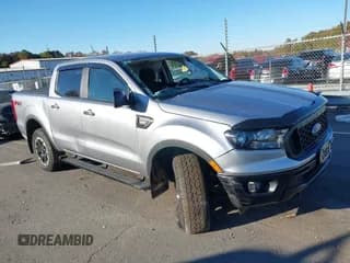 ✅ 2021 Ford Ranger XLT • VIN: 1FTER4FH5MLD07829 • Lot: 43664812. Listed on IAAI with 48,908 mi. Free auction sales archive from the USA and detailed vehicle history report at DreamBid. Image 1.