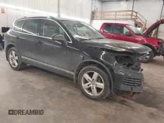 ✅ 2012 Volkswagen Touareg Sport • VIN: WVGEF9BP8CD009511 • Lot: 41457989. Wystawiony na IAAI z przebiegiem 87 325 mil. Bezpłatny archiwum sprzedaży aukcyjnych z USA i szczegółowy raport historii pojazdu na DreamBid. Zdjęcie 1.
