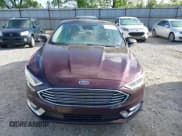 ✅ 2017 Ford Fusion Titanium • VIN: 3FA6P0D90HR231500 • Lot: 42220802. Listed on IAAI with 104,041 mi. Free auction sales archive from the USA and detailed vehicle history report at DreamBid. Image 12.