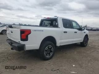 ✅ 2022 Ford F-150 Lightning Pro • VIN: 1FTVW1EL4NWG00554 • Лот: 90142765. Опубликован ранее на Copart с пробегом 69 680 миль. Бесплатный доступ к архиву аукционных продаж из США и подробный отчёт об истории автомобиля на DreamBid. Изображение 3.