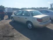 ✅ 2002 Saturn SL • VIN: 1G8ZH52812Z227514 • Lot: 42859934. Listed on IAAI with 84,221 mi. Free auction sales archive from the USA and detailed vehicle history report at DreamBid. Image 3.