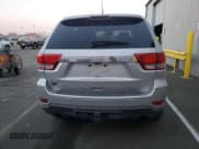 ✅ 2012 Jeep Grand Cherokee Overland • VIN: 1C4RJFCT8CC332736 • Lot: 87726165. Listed on Copart with 151,711 mi. Free auction sales archive from the USA and detailed vehicle history report at DreamBid. Image 6.