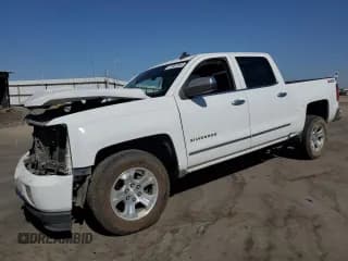 ✅ 2018 Chevrolet Silverado 1500 LTZ • VIN: 3GCUKSECXJG336990 • Лот: 71687004. Опубликован ранее на Copart с пробегом 134 284 миль. Бесплатный доступ к архиву аукционных продаж из США и подробный отчёт об истории автомобиля на DreamBid. Изображение 1.