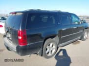 ✅ 2014 Chevrolet Suburban LTZ • VIN: 1GNSKKE74ER169548 • Lot: 43560269. Listed on IAAI with 255,008 mi. Free auction sales archive from the USA and detailed vehicle history report at DreamBid. Image 4.